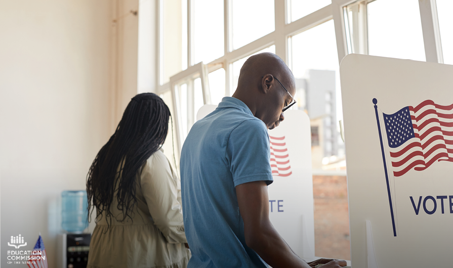 Two people, one with long braids and another with a bald style and dark brown skin, vote at election booths set up by a well-lit window.